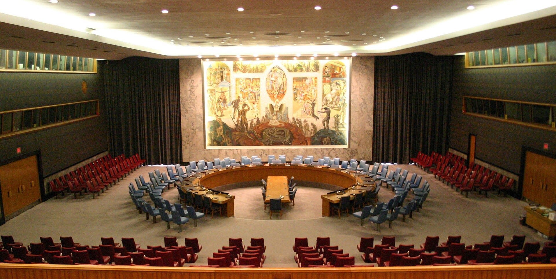 The horseshoe-shaped table of the United Nations Security Council chamber in New York